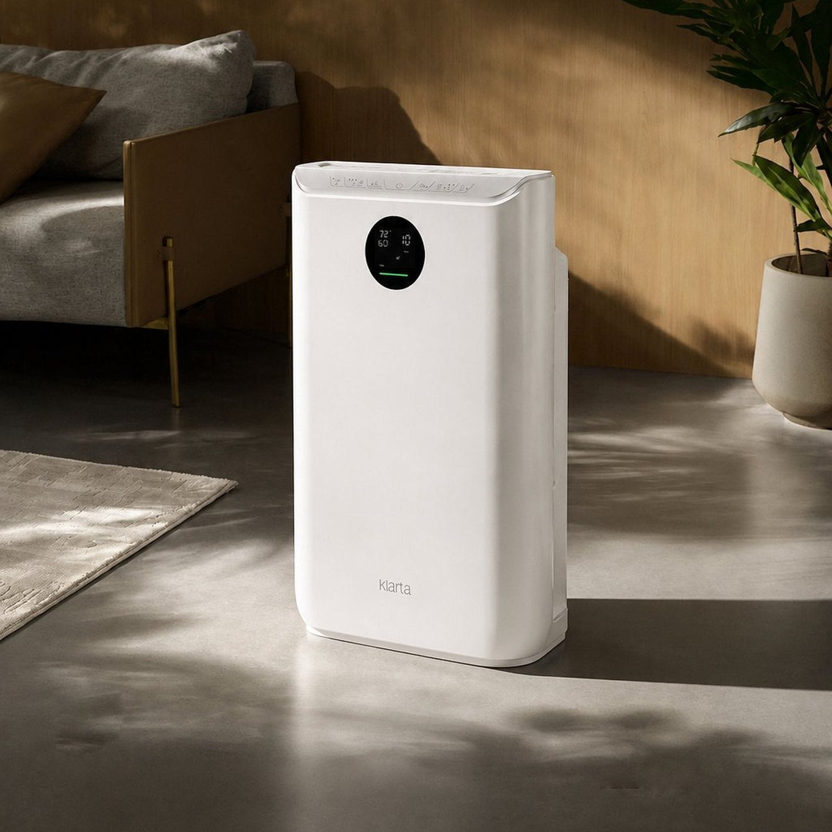 Klarta Stor air purifier in White in a living room with warm wood panelling