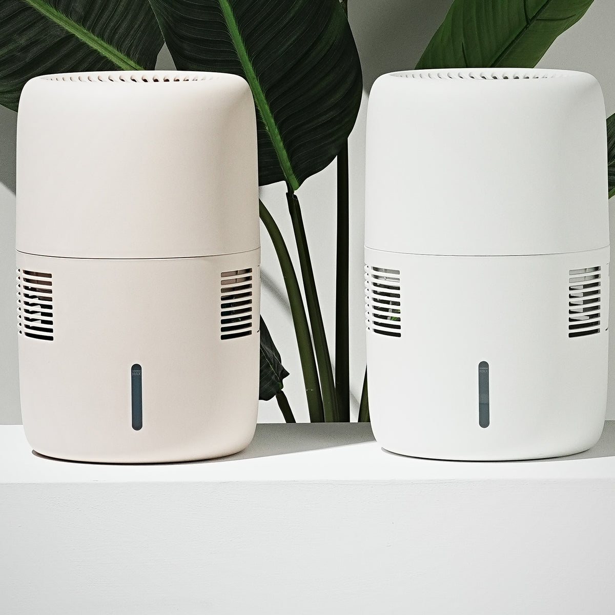 Klarta Humea evaporative humidifiers in Beige and White side by side
