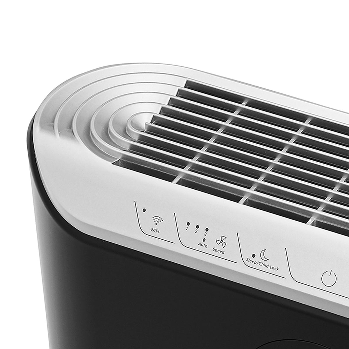Top air outlet grille and touch controls of the Klarta Stor air purifier in Full Black