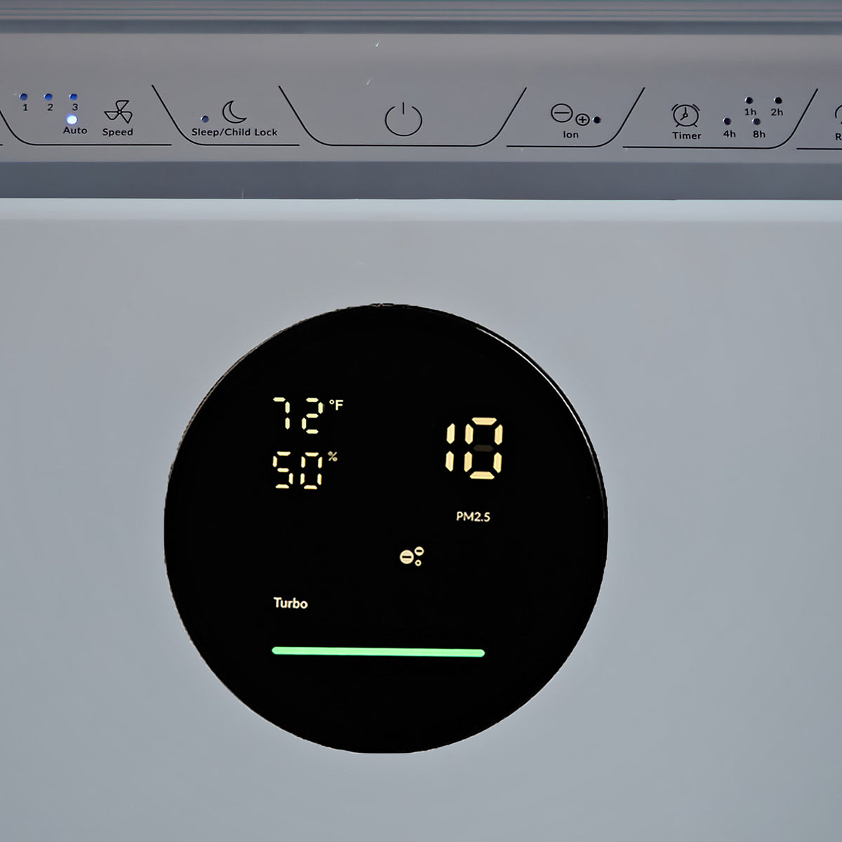 The round display and top touch controls on the Klarta Stor air purifier in Silver, photographed in a kitchen